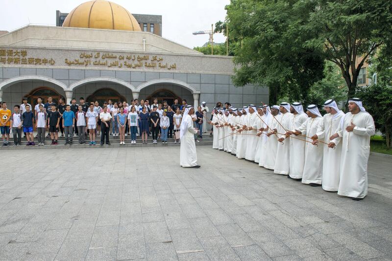 The event’s cultural activities include the traditional Al Ayyalah 'stick dance'. Courtesy WAM