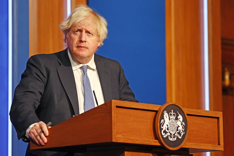 Prime Minister Boris Johnson at a press conference in Downing Street after ministers met to consider imposing new restrictions in response to rising cases and the spread of the Omicron variant. PA