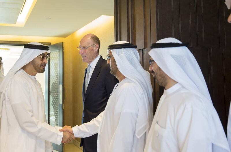 Sheikh Mohammed bin Zayed greets a guest during a moral education forum held at Eastern Mangroves Hotel and Spa by Anantara. Mohammed Al Hammadi / Crown Prince Court - Abu Dhabi