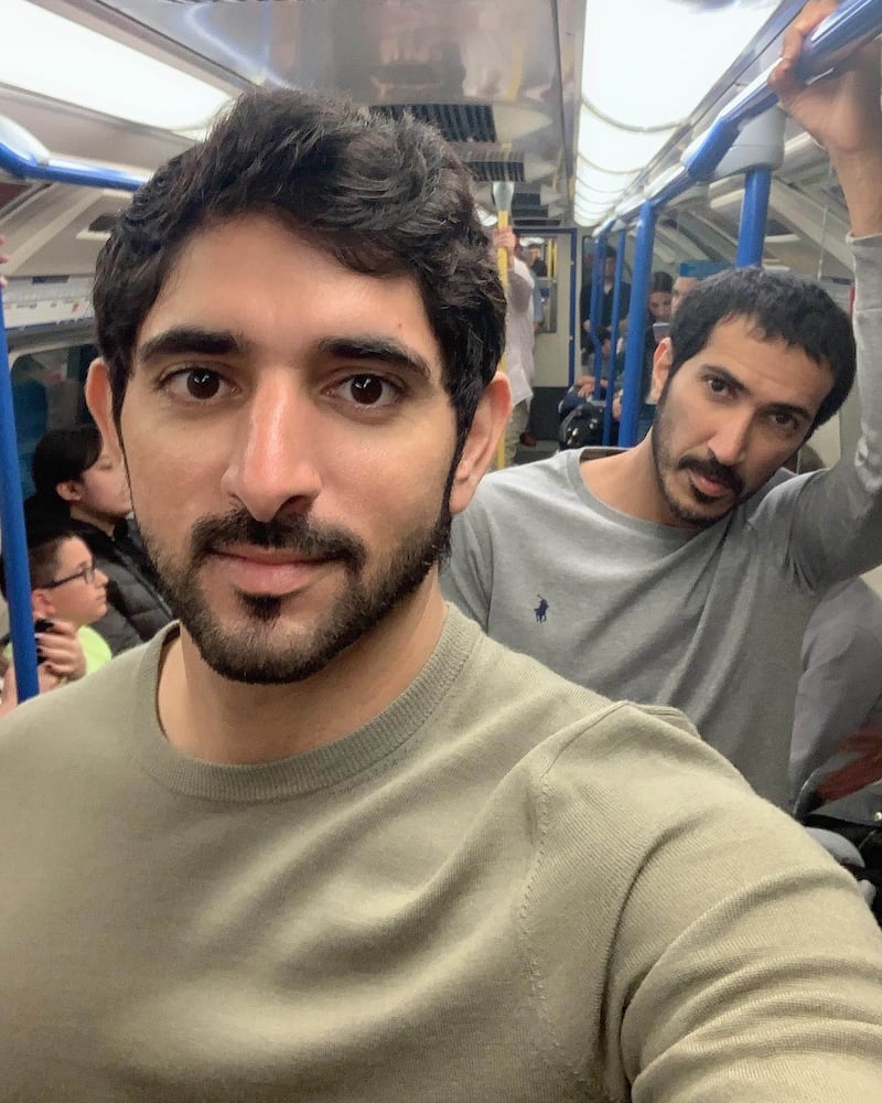 Sheikh Hamdan rides the London Underground with close friend Badr Ateej.