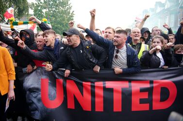 Fans take part in an organised protest march outside the ground against the Manchester United owners before the Premier League match against Liverpool at Old Trafford, Manchester. Picture date: Monday August 22, 2022.