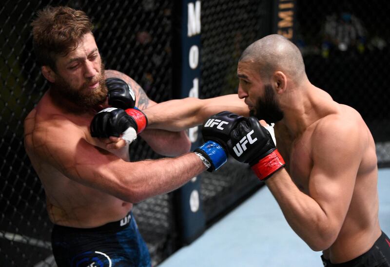 LAS VEGAS, NEVADA - SEPTEMBER 19: (R-L) Khamzat Chimaev of Chechnya punches Gerald Meerschaert in their middleweight bout during the UFC Fight Night event at UFC APEX on September 19, 2020 in Las Vegas, Nevada. (Photo by Chris Unger/Zuffa LLC)