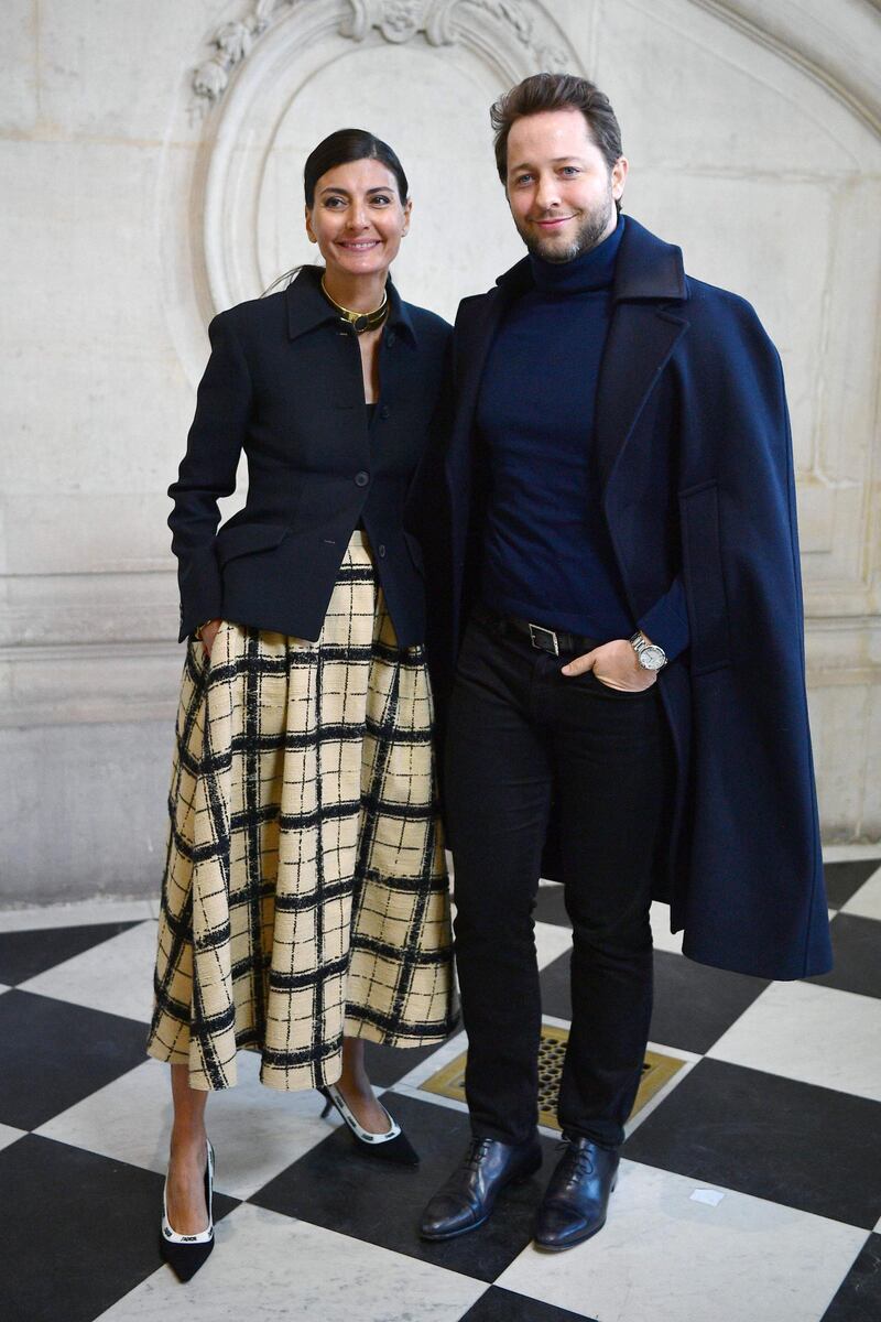 Italian fashion editor Giovanna Battaglia Engelbert (L) and US actor and journalist Derek Blasberg pose ahead of the Dior Women's Spring-Summer 2020 show. AFP