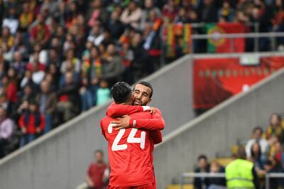 BRAGA, PORTUGAL - MAY 28: Anice Badri #24 celebrates with Naim Sliti of Tunisia after scoring a goal during the international friendly football match against Portugal and Tunisia at the Municipal stadium de Braga on May 28, 2018 in Braga, Portugal. (Photo by Octavio Passos/Getty Images)