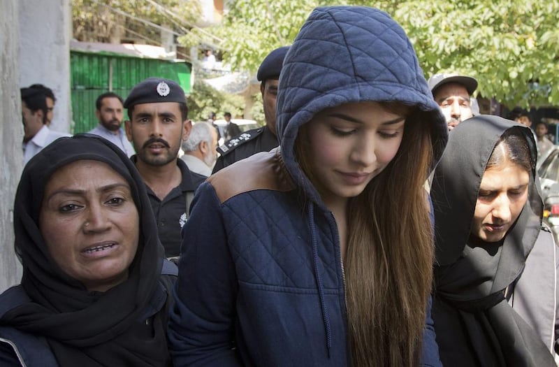 Pakistani model Ayyan Ali was detained in March for trying to fly to Dubai with half a million dollars in her bags. B K Bangash / AP Photo