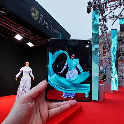 Maya Jama wearing a 5G dress, and what it looked like via the app, on the red carpet at the 73rd BAFTA’s in London.