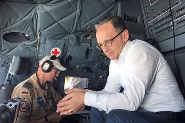 German Foreign Minister Heiko Maas sits in the C-160 Transall military plane at Baghdad Airport. Reuters