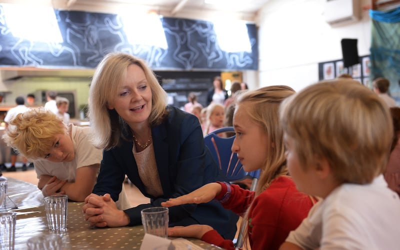 Liz Truss at a West London school in 2014 to launch a government plan to get more locally sourced and grown food into schools and hospitals. Getty Images