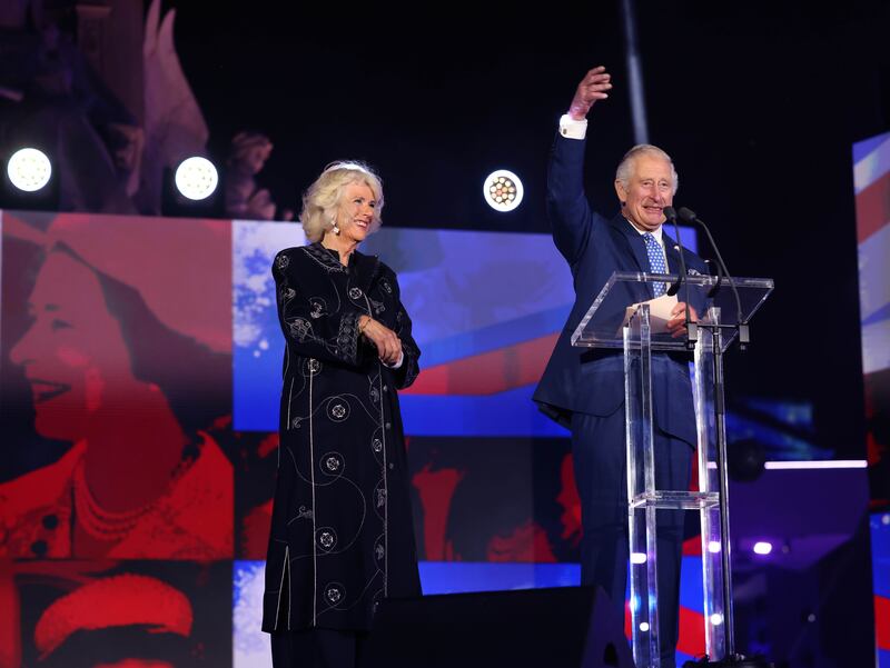Britain's Prince Charles, with his wife Camilla, speaks at the BBC Party at the Palace in London on June 4. WPA Pool / Getty