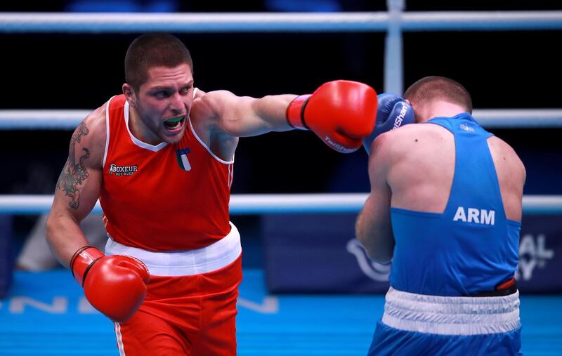 Italy's Salvatore Cavallaro, left, was beaten by Arman Darchinyan of Armenia in their middleweight bout. PA