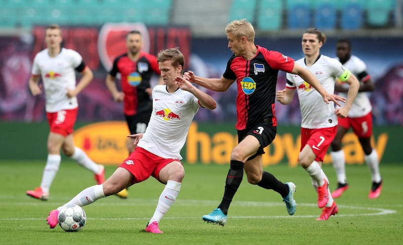 Leipzig's Daniel Carvajal under pressure from Per Skjelbred of Hertha Berlin. Getty