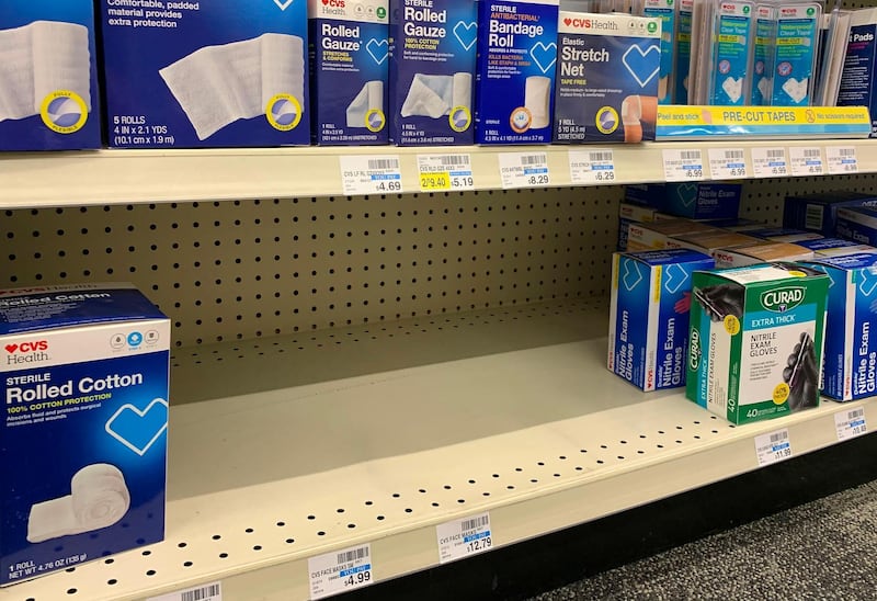An empty shelf in a local pharmacy that used to contain protective masks which are now sold out, as people scramble to protect against the spread of the Coronavirus, in Los Angeles, California. AFP