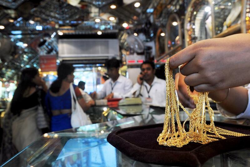 Demand for the precious metal in India is forecast to increase by about 15 per cent from this month to December compared with the same period last year. Dibyangshu Sarkar / AFP