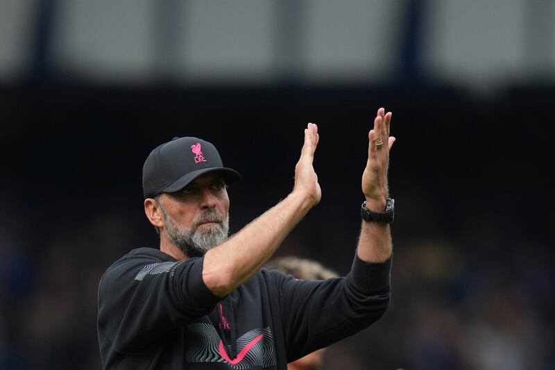 Liverpool's manager Jurgen Klopp applauds supporters. AP