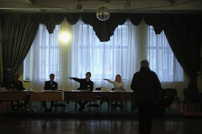 People arrive to cast their vote inside a polling station in Simferopol, Ukraine. Dan Kitwood / Getty 