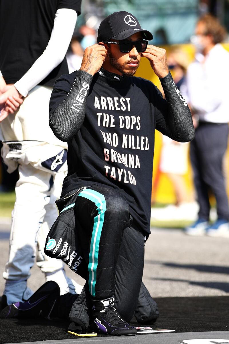 Lewis Hamilton takes a knee before the race in support of anti-racism movements. Getty