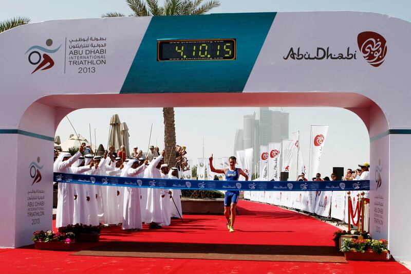 Abu Dhabi, United Arab Emirates, March 2, 2013:    Alistair Brownlee of Britain celebrates racing to victory during the male short distance of the Abu Dhabi International Triathlon in Abu Dhabi on March 2, 2013. Christopher Pike / The National
