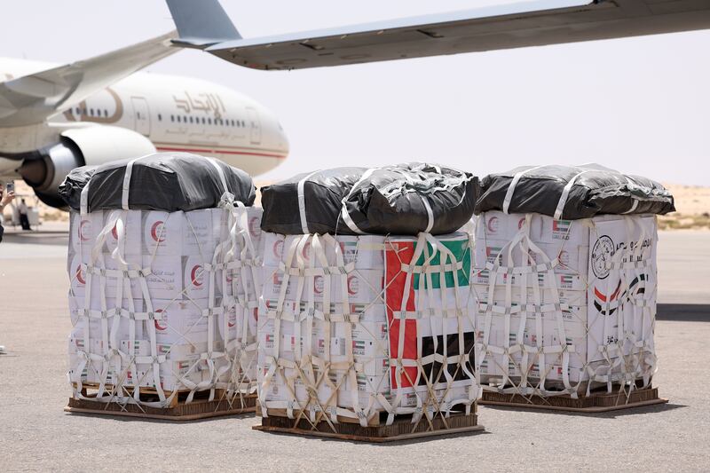 Aid is loaded on to a military plane at Al Arish International Airport, Egypt, to be dropped over Gaza. All photos: Chris Whiteoak / The National