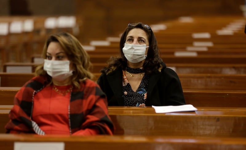 Worshippers attend Christmas Eve Mass at Saint Joseph Catholic Church in Cairo. AP