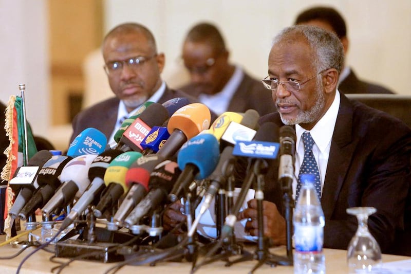 Sudanese Foreign Minister Ali Karti, right. Nile dam talks between the foreign and water ministers of Egypt, Sudan and Ethiopia have reached a preliminary agreement.  Ashraf Shazly / AFP Photo

