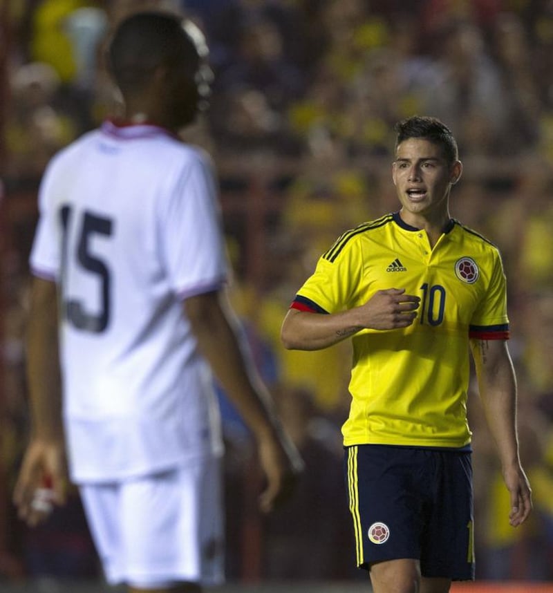 Colombia midfielder James Rodriguez, right, gestures during a friendly football match against Costa Rica at Diego Armando Maradona stadium in Buenos Aires, Argentina on June 6, 2015.  AFP PHOTO / Alejandro PAGNI

