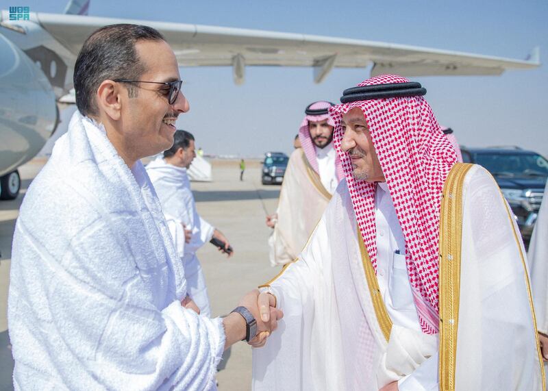 Mr Al Khuraiji welcomes Qatar's Foreign Minister Mohammed Bin Abdulrahman Al Thani. AFP 