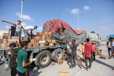 Lorries carrying aid at the Rafah crossing into Gaza on Thursday. Getty Images