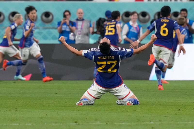 Maya Yoshida celebrates after Ritsu Doan scores Japan's equaliser against Germany, the Japanese going on to win 2-1 at Khalifa International Stadium. AP