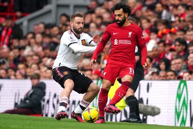 File photo dated 05-03-2023 of Luke Shaw (left) with Liverpool's Mohamed Salah. Luke Shaw apologised for a "completely unacceptable", "embarrassing" and "disgraceful" 7-0 loss at Liverpool that he says cannot be allowed to derail Manchester United's season. Issue date: Monday March 6, 2023.