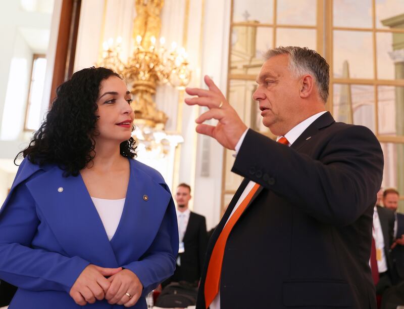 Kosovo President Vjosa Osmani Sadriu speaks to Viktor Orban. EPA