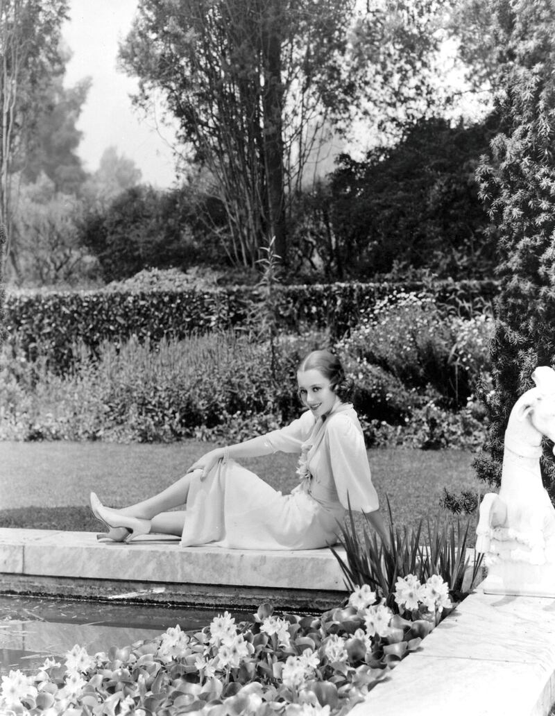 circa 1938:  Hollywood screen star Olivia De Havilland relaxes in the garden of her new home in Hollywood.  (Photo by Hulton Archive/Getty Images)