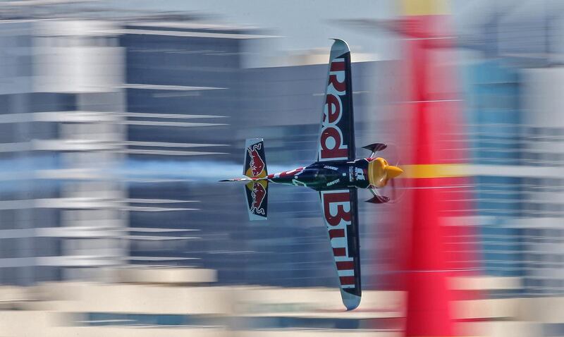 Martin Sonka of the Czech Republic manoeuvres his plane during a practice run fo the 2019 Red Bull Air Race World Championship in Abu Dhabi. AFP