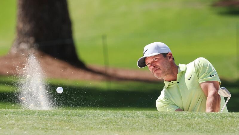 Paul Casey hits out of the sand on the seventh hole during a practice round at the 2021 Masters. EPA