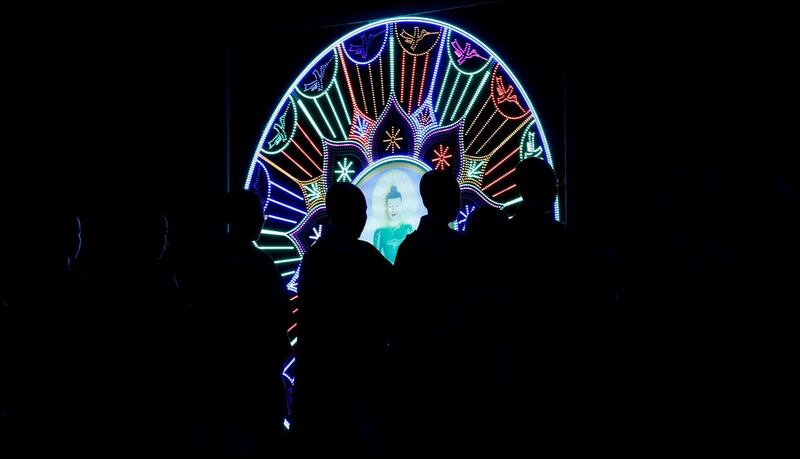 Buddhist monks pray at a candle light vigil during Vesak Day, an annual celebration of the birth of Buddha,  at Tam Chuc Pagoda in Ba Sao town, Vietnam. Reuters