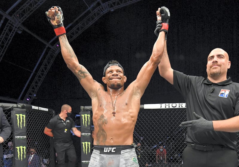 ABU DHABI, UNITED ARAB EMIRATES - JULY 26: Alex Oliveira of Brazil celebrates after his victory over Peter Sobotta of Poland in their welterweight fight during the UFC Fight Night event inside Flash Forum on UFC Fight Island on July 26, 2020 in Yas Island, Abu Dhabi, United Arab Emirates. (Photo by Jeff Bottari/Zuffa LLC via Getty Images)