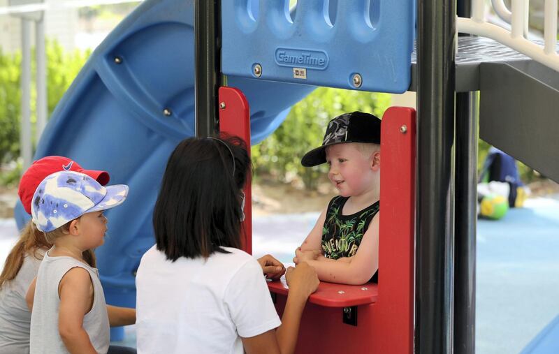 Dubai, United Arab Emirates - Reporter: N/A. News. William (R) and Oliver play in the park as children's play areas start to open around Dubai. Wednesday, June 24th, 2020. Dubai. Chris Whiteoak / The National