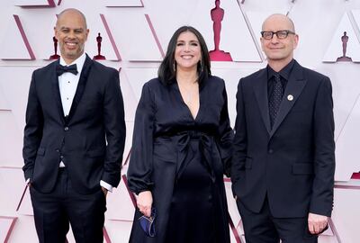 Jesse Collins, Stacey Sher, and Steven Soderbergh arrive to the 93rd Academy Awards, at Union Station, in Los Angeles, U.S., April 25, 2021. Chris Pizzello/Pool via REUTERS
