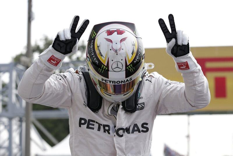 Mercedes' Lewis Hamilton celebrates qualifying in pole position on Saturday. Max Rossi / Reuters / September 3, 2016