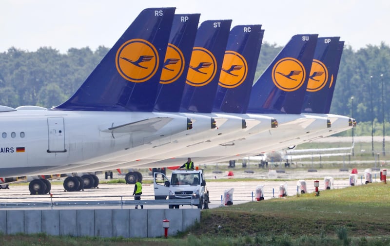 FILE PHOTO: Planes of German airline Lufthansa are parked at the Berlin Schoenefeld airport amid the spread of the coronavirus disease (COVID-19), Schoenefeld, Germany, May 26, 2020. REUTERS/Fabrizio Bensch/File Photo
