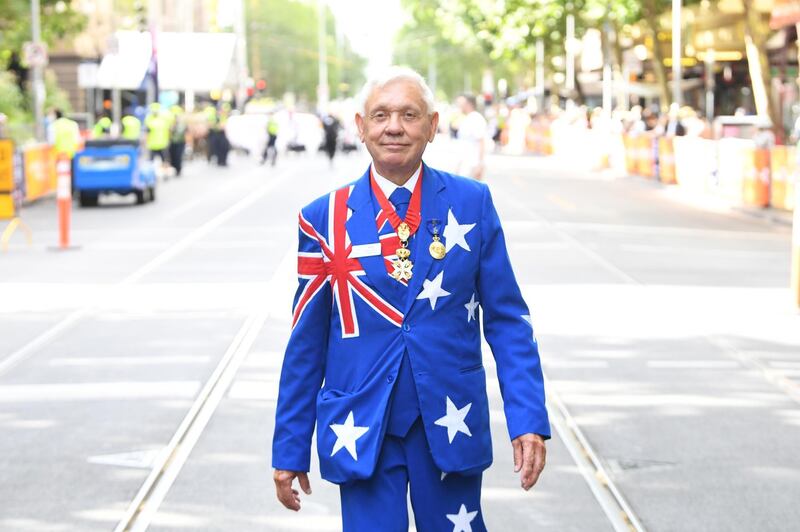 An Australia Day attendee poses for photos during Australia Day celebrations in Melbourne. EPA