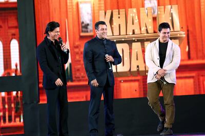 A handout photo showing (L-R) Shah Rukh Khan, Salman Khan and Aamir Khan on Aap Ki Adalat (Courtesy: Star TV)