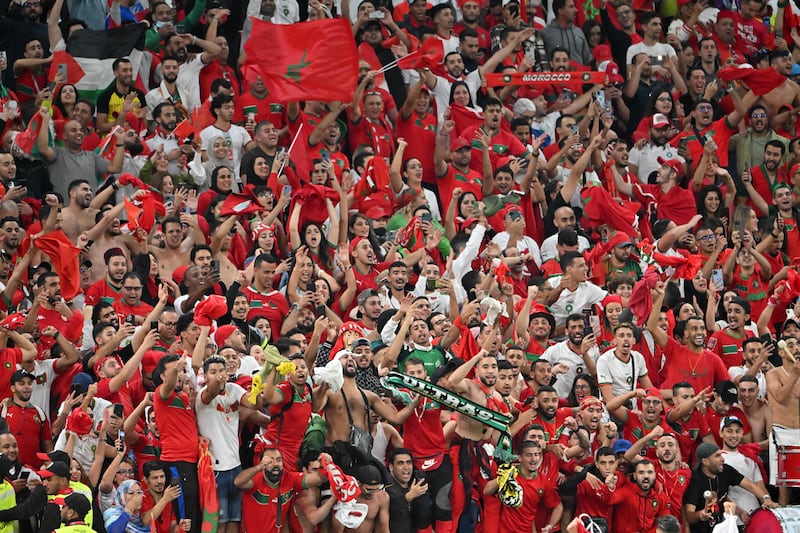 Morocco fans celebrate winning the World Cup quarter-final match against Portugal at Al Thumama Stadium, in Doha. AFP