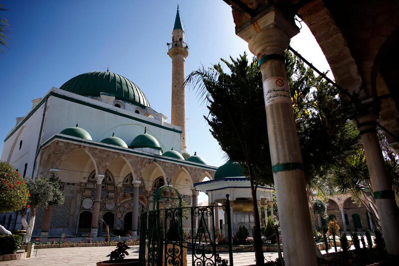 A picture taken on April 26, 2014 shows the Al-Jazzar mosque in the ancient Mediterranean port town of Akko, north of Haifa, Israel. The Canaanites, the Greeks, the Romans, the Byzantines, the Crusaders, the Mamelukes, the Turks and the British have left their footprints in the port city, today a mixed Arab and Jewish town. Akko's (aka Acre) most prominent sites include ruins from the Hellenistic-Roman period and buildings from the Crusader and Ottoman periods: Al Jazar Mosque, the buildings of the Order of Saint John, the subterranean Crusader city, the Turkish Baths.  AFP PHOTO / THOMAS COEX (Photo by THOMAS COEX / AFP)