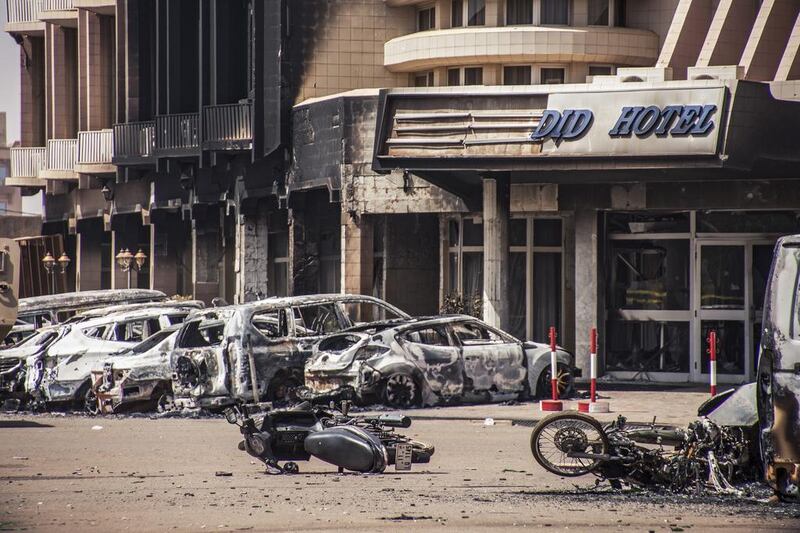 Damaged vehicles from two car bombs outside the Splendid Hotel in Ouagadougou, Burkina Faso, on January 16, 2016. Wouter Elsen/EPA 