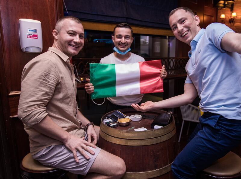 Dimon, Sergiu and Iuilan pictured at Cooper’s Bar and Restaurant in Abu Dhabi ahead of the Euro 2020 final against Italy.