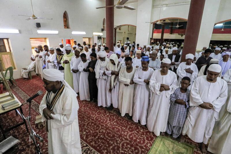 Sudanese worshippers gather on the first day of Eid Al Fitr in the Juraif Gharb area of Khartoum. All photos: AFP