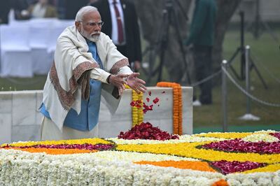 India's Prime Minister Narendra Modi pays tribute at the Mahatma Gandhi memorial in New Delhi on Tuesday. AFP