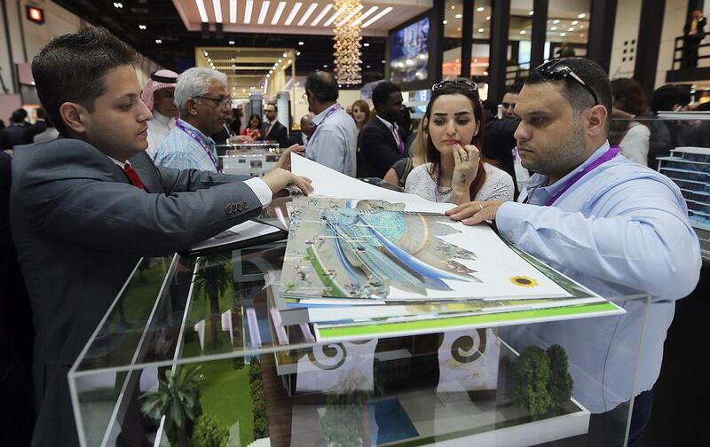 Miniature villas are on display at Damac's stand on the Cityscape Global 2014. Satish Kumar / The National