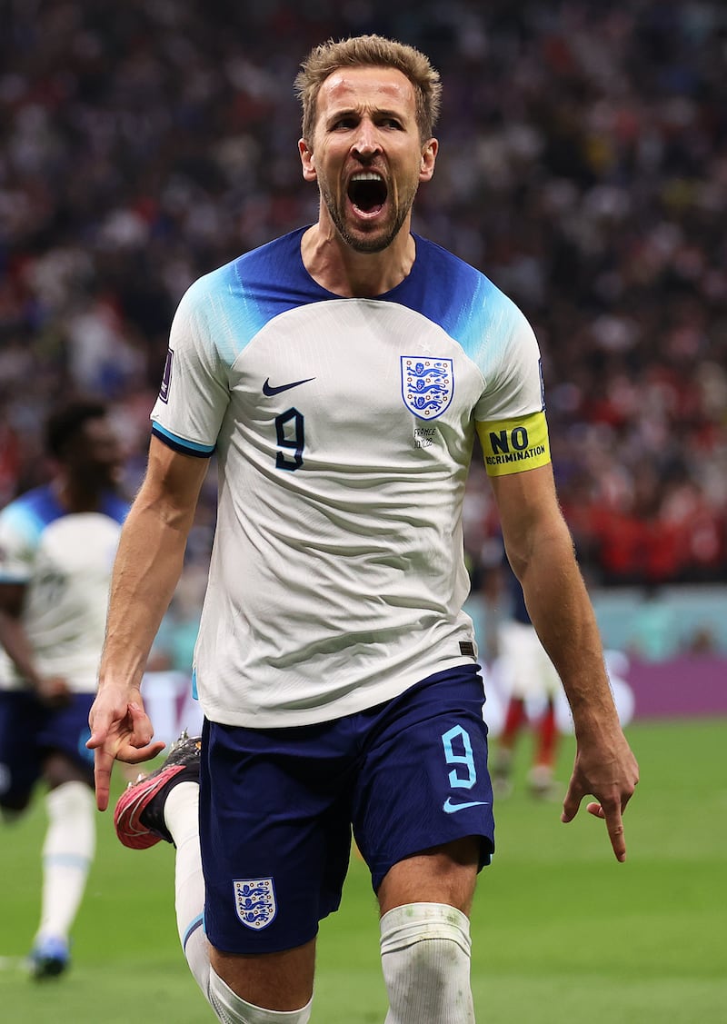 Kane celebrates after scoring for England. Getty