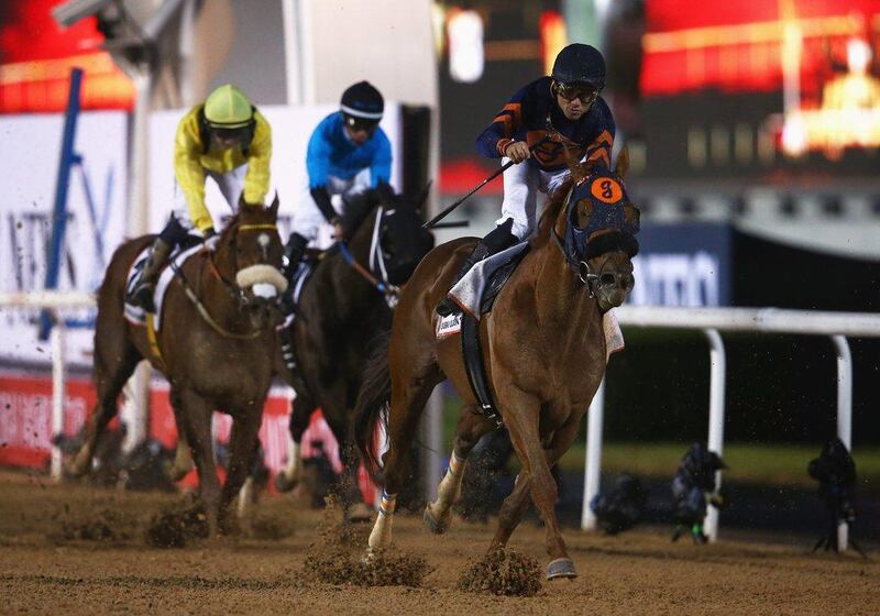 Joel Rosario rides Mind Your Biscuits to win the Dubai Golden Shaheen. Francois Nel / Getty Images